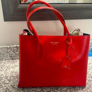 Red Kate Spade purse with detachable shoulder strap